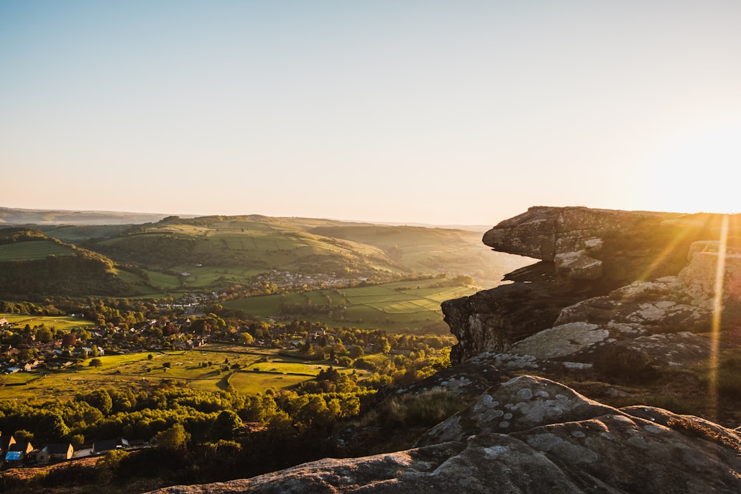 Scenic valley view of Matlock Peak District with town nestled below rolling hills and green landscape